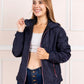 Cortaviento TH Mujer